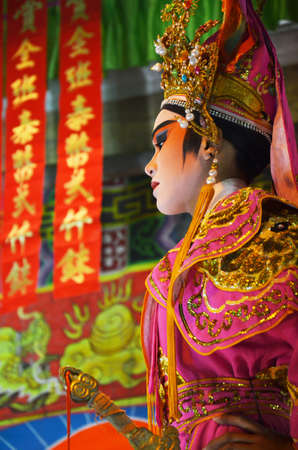 Thai people of chinese descent acting playing present traditional chinese contemporary classical opera for show local people in happy new years festival at city on March 13, 2011 in Bangkok Thailandのeditorial素材