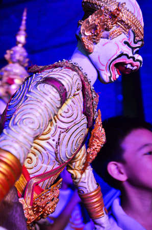 Ancient puppets toy or antique marionette thai style for playing acting on stage show thai people and foreign travelers travel visit festival event fair in night time at Sam Yan in Bangkok, Thailandの写真素材