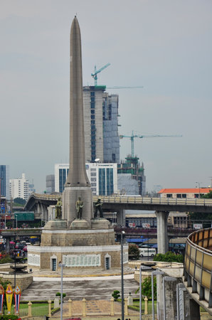 Aerial view landscape cityscape of bangkok city and high building condominium and railway track electric BTS skytrain at Victory Monument area of Ratchathewi urban on July 6, 2013 in Bangkok, Thailandのeditorial素材