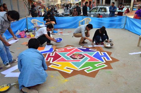 Nepalese drawing made rangoli symbol from powder or sand paint color art for nepali people respect praying rite to deity in diwali festival of lights at Thamel on November 3, 2013 in Kathmandu Nepalのeditorial素材