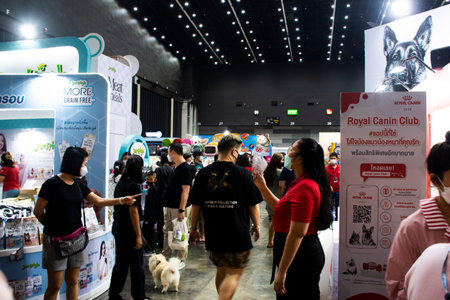 Thai people and foreign travelers travel visit and walking select buy shopping products goods in largest pet animal dog cat market event fair at Bitec Bangna on September 8, 2022 in Bangkok, Thailandのeditorial素材