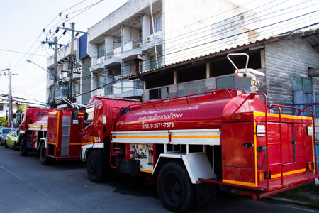Emergency fire vehicle truck stop waiting for firefighter use conflagration accident in car parking of fire fighting station station at Bang Bua Thong city on November 3, 2022 in Nonthaburi, Thailandのeditorial素材