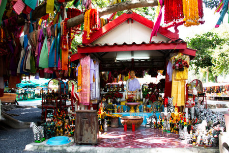 Ancient shrine antique angel deity statue for thai people travelers travel visit and respect praying make a wish offerings blessing mystic  at Song Phi Nong on November 3, 2022 in Suphan Buri Thailandのeditorial素材