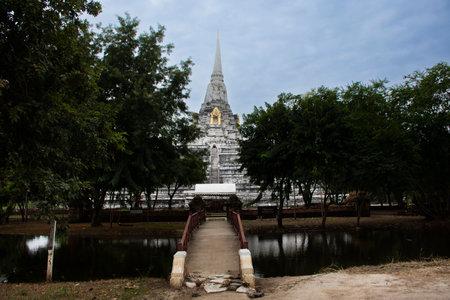Ancient stupa Phukhao Thong antique ruin chedi for thai people travel visit respect praying blessing buddha holy wish mystery myth at Wat Phu Khao Thong temple on November 6,2022 in Ayutthaya Thailandのeditorial素材