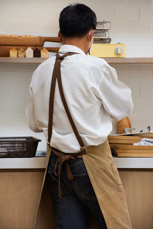 Barista men staff and service worker man working in classic modern cafe coffee and bakery shop restaurant for thai customer people eat drinks  and use service in Pathum Thani, Thailandの写真素材