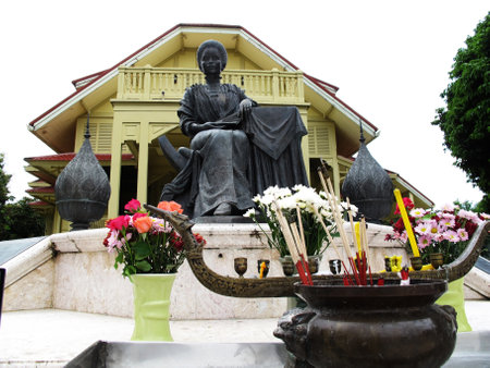 Ancient wooden building and antique wood architecture of Dara Phirom Palace Museum with Dara Rasmi princess statue for thai people travelers travel visit on October 7, 2012 in Chiang Mai, Thailandのeditorial素材