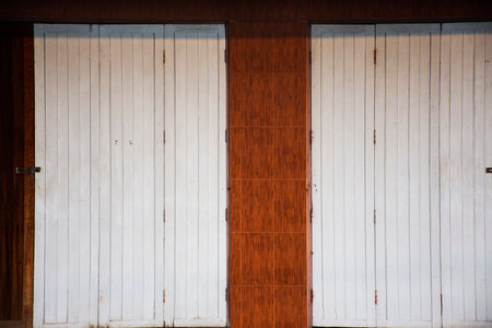 Art vintage wooden window or retro wood door in antique style building and architecture classic house home for thai people living at countryside Khlong Wan Village in Prachuap Khiri Khan, Thailandの写真素材