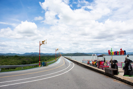 View landscape mountain and street road on crest reservoir of Krasiao dam at viewpoint for thai people travelers travel visit rest relax at Suphanburi city on August 24, 2023 in Suphan Buri, Thailandのeditorial素材
