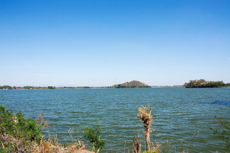 View landscape water lake dam and mountain in Phu Sub Lek catchment for thai people and foreign travelers travel visit and rest relax with freshness environment on crest reservoir in Lopburi, Thailandの写真素材
