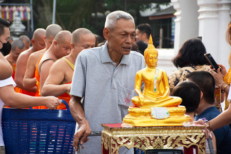 Buddhist priests monastery Kathin ceremony for Local thai people observe religious precepts robes to the Buddhism monk and donate money at Wat Prasat temple on October 18, 2024 in Nonthaburi, Thailandのeditorial素材