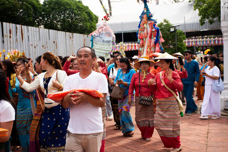 Local thai people join parade attend procession ritual give offering to Buddhist monk or buddhism priest in Kathin ceremony celebration at Wat Prasat temple on October 20, 2024 in Nonthaburi, Thailandのeditorial素材