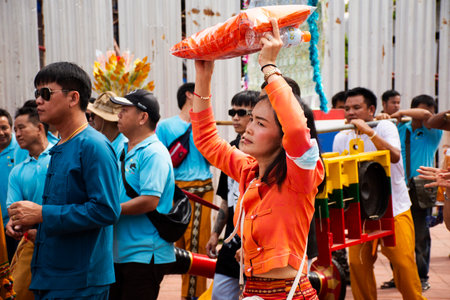 Local thai people join parade attend procession ritual give offering to Buddhist monk or buddhism...