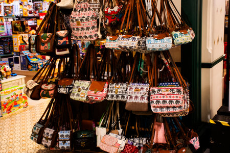 Traditional accessory souvenir made from fabric handwoven cotton and gifts design thai style for show and sale traveler people in handicraft local market or handmade craft bazaar at Bangkok, Thailandの写真素材