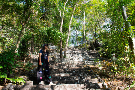 Travelers thai women people journey travel visit trail hiking on step stairs in forest on mountain...