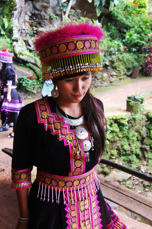 Thai women travelers people travel visit and rent traditional tribe clothes wearing costume for take photo in Doi Pui Hmong Valley hill Village at Doi Suthep Pui National Park in Chiang Mai, Thailandの写真素材