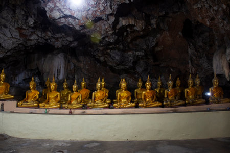 Antique tunnel cave for thai people travelers travel visit with respect praying ancient holy buddha...