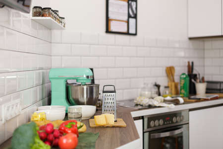 Young couple preparing a pie in the kitchenの写真素材