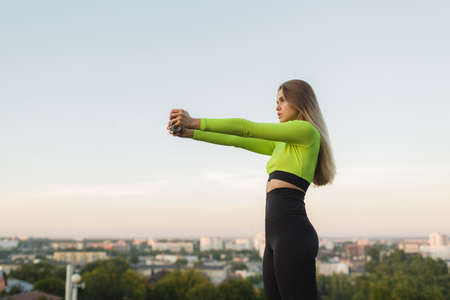 Fitness sport woman doing workout. Sport tight clothes.の写真素材