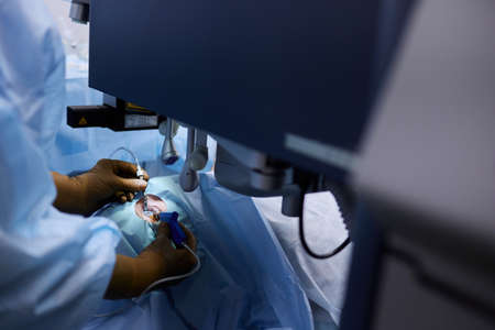 Surgeons performing eye surgery in the operating room