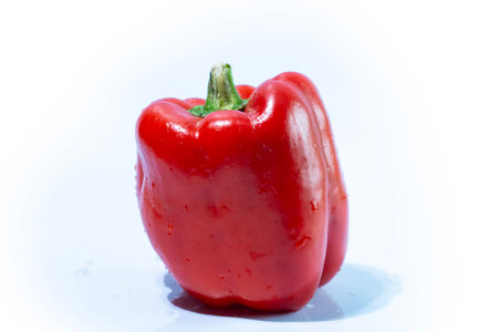 Red bell pepper isolated on white background with clipping path. Close up.の写真素材