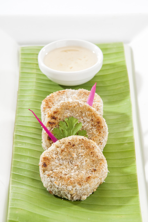 Tasty croquette with dipping sauceの写真素材