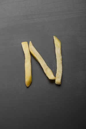Alphabet N formed by french friesの写真素材