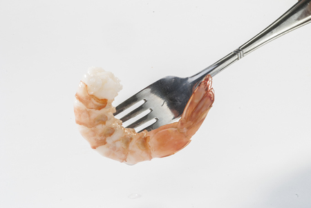Cooked jumbo shrimp on ss forkの写真素材