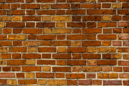 The texture of their multi-colored bricks. The wallの写真素材
