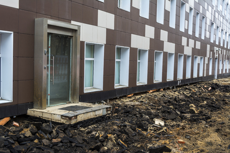 Repair of the road opposite the office building.の写真素材