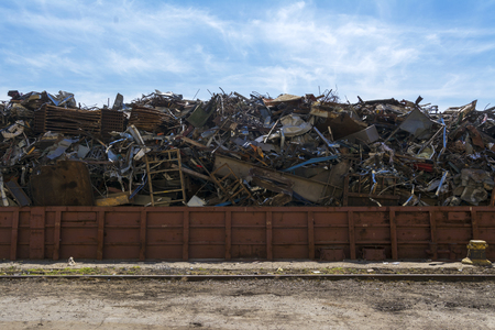 Large barge with scrap metal at the pierの写真素材