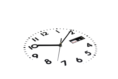 The watch face is tilted. The hands on the clock. Calendar, Sunday, first day.の写真素材