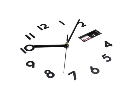 Isolated. The watch face is tilted. The Dial of watches. The hands on the clock. Calendar, Sunday, first day.の写真素材