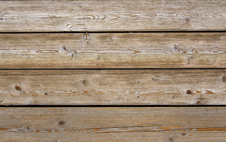 The texture of the boards. Wooden wall of the house. A fence made of boards. Wooden floor Naturalの写真素材