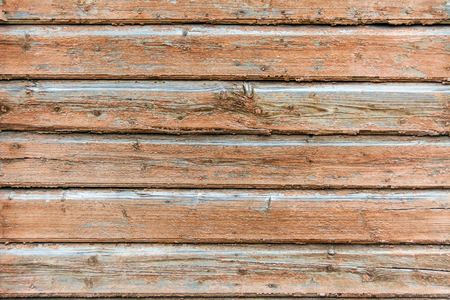 The texture of wooden boards. A fence made of boards. The wall of wooden house. Old paintの写真素材