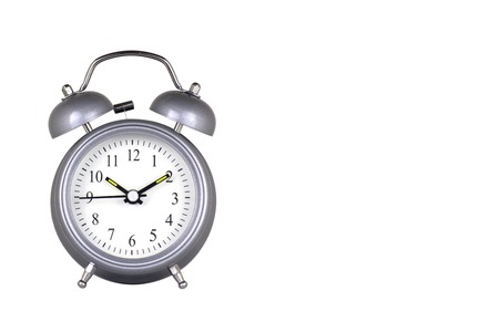 Grey alarm clock with bells on white background isolatedの写真素材