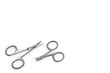 Nail Clippers for nail and cuticle care. Two scissors of different size on white background.の写真素材