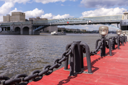 View of the Moscow river. River ship and bridge. The sharpness of the chainの写真素材