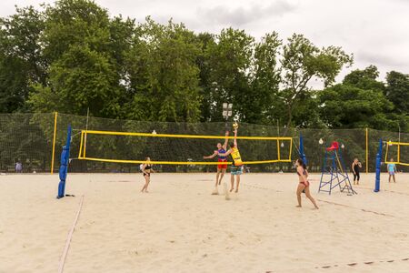 Moscow. Russia. 12 june 2019. Beach volleyball. People play volleyball on the sand in the city Parkのeditorial素材