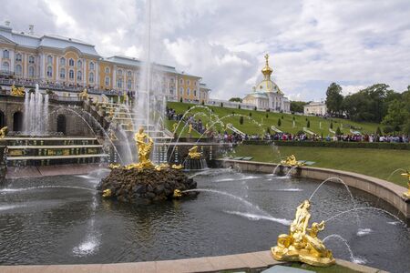 Peterhof, Russia, 08 aug 2019. Golden statues and fountains in the Palace complexのeditorial素材