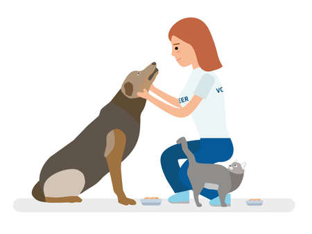 Young volunteer girl feeds homeless animals - dog and cat.のイラスト素材