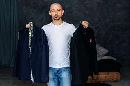 In the face of difficult choices. a man makes a choice which official costume to wear.