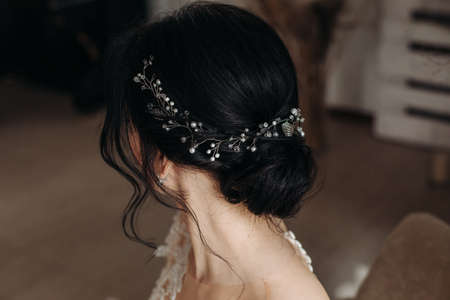Beauty wedding hairstyle. Bride. Brunette girl with curly hair