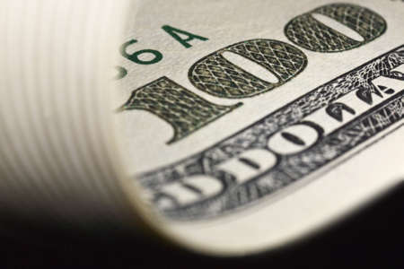 greatly enlarged detail of a $ 100 banknoteの写真素材