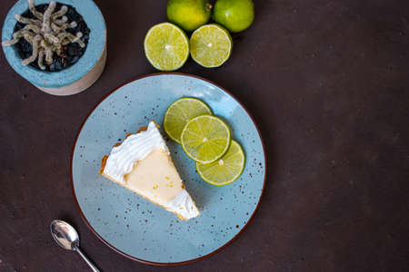 Lemon Pie On A Plate On Brown Backgroundの写真素材