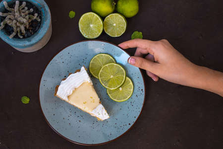 Lemon Pie On A Plate On Brown Backgroundの写真素材