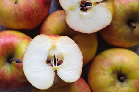 close-up cut apple on the background of applesの写真素材