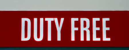 illuminated red sign at an airport, text の写真素材