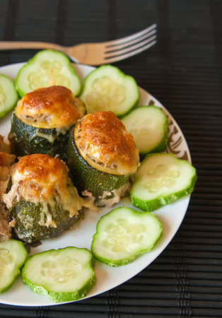 baked marrows with minced meat filling, covered with cheeseの写真素材