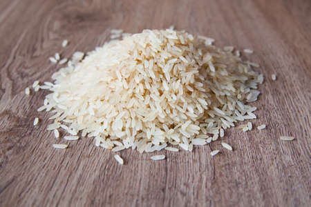 close-up white long rice on a kitchen table