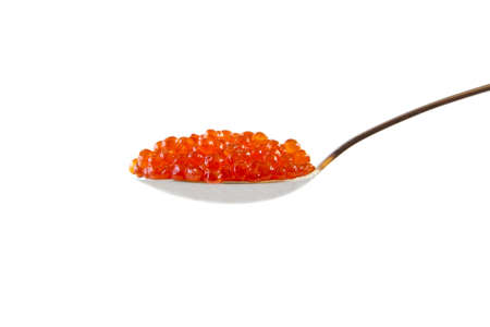 red caviar on a teaspoon isolated on white backgroundの写真素材